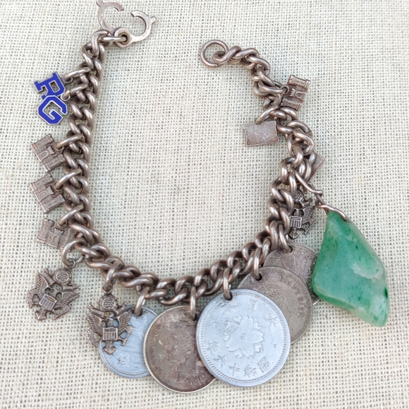 Antique Jewelry - Antique sterling war charms from around the world charm bracelet